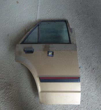 P3-21 PUERTA TRASERA DERECHA FORD ESCORT OCASION